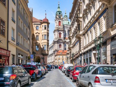 Prague, Czech Republic - June 2022: Boat with tourists on certovka canal in the center of Prague.