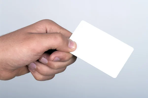 Cartão de papel na mão — Fotografia de Stock