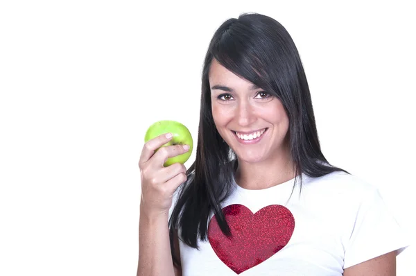 Ung kvinna som håller ett äpple — Stockfoto