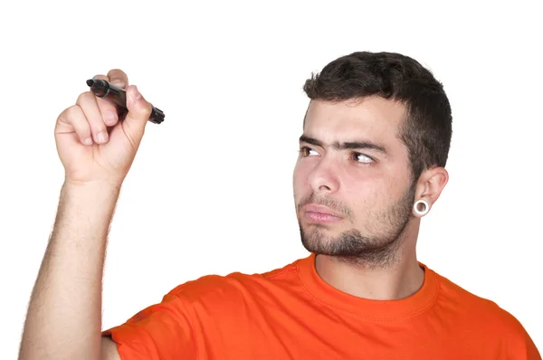 Young man writing with a pen on transparent glass — Stock Photo, Image