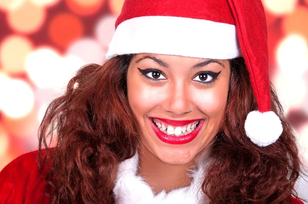 Piękna brunetka sobie Święty Mikołaj — Zdjęcie stockowe