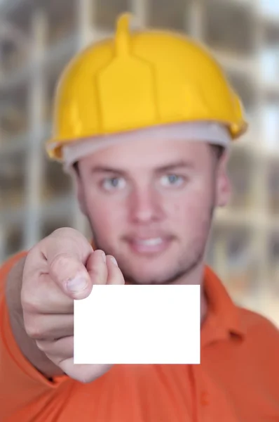 Engineer man holding blank business card — Stock Photo, Image