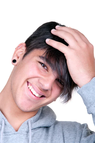 Nastoletni chłopak uśmiechając się — Zdjęcie stockowe