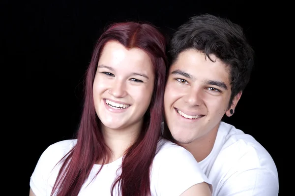 Portrait of smiling young couple — Stock Photo, Image