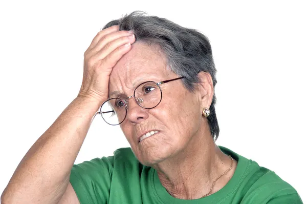 Egy idősebb hölgy, miután a fejfájás portréja — Stock Fotó