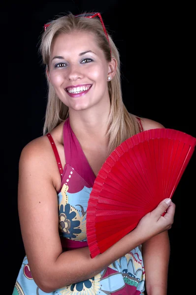 Chica rubia con ventilador —  Fotos de Stock