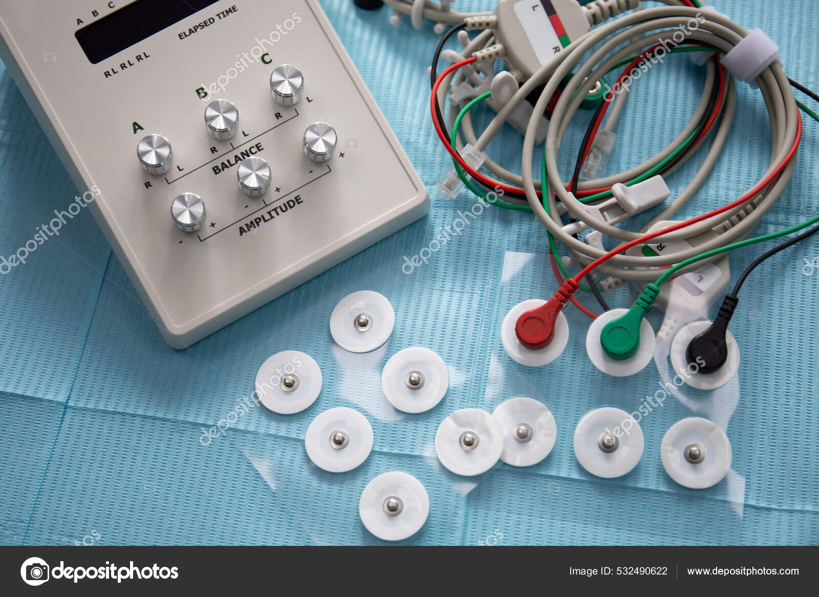 Device for neuromuscular stimulation of temporomandibular joint with wires and electrodes on the