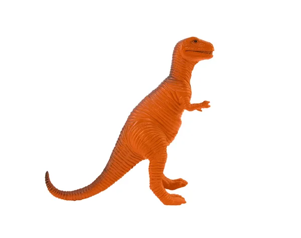 Оранжевая игрушка тираннозавра. — стоковое фото