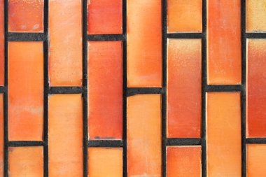 Kırmızı renkli tuğla duvar yüzeyinin fotoğraf dokusu.