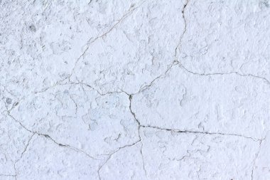 Çatlak beton duvar yüzeyinin foto dokusu.