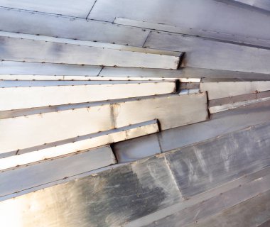 Paslanmaz çelik zırhlı desenli fotoğraf sıcak ve mavi tonlarda çizilmiş yüzey plakaları..