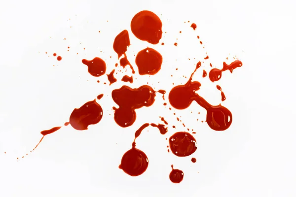白い背景に赤い血がちりばめられた滴の写真 — ストック写真