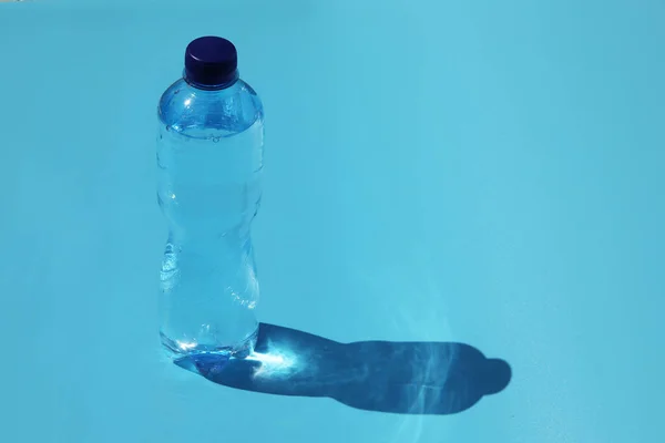 Bottle Cold Water Blue Background — Photo