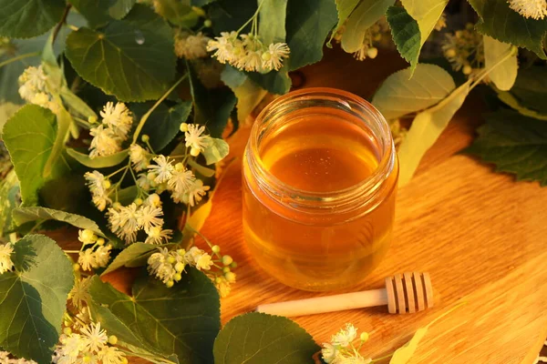 jar of linden honey with linden blossom