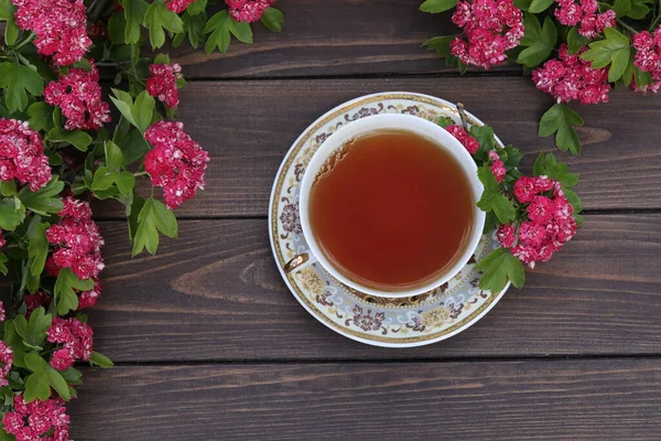 Cup Tea Brown Wooden Background Pink Flowers — Stock Photo, Image