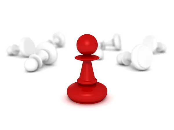 Red pawn standing infront of some white lying pawns — Stock Photo, Image