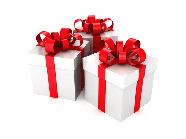 Gift boxes with a ribbon on white background — Stock Photo, Image