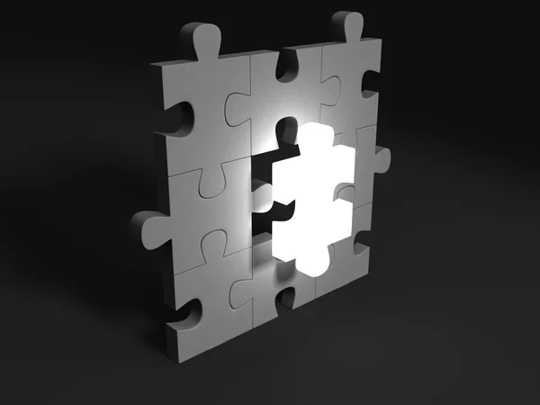 Jigsaw puzzle stuk lichten in het donker — Stockfoto