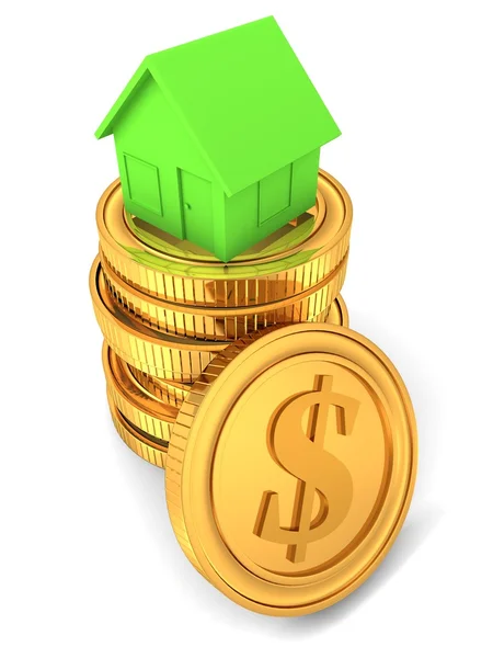 Kleine groene huis op munten — Stockfoto