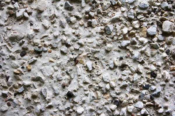 Pequeñas piedras fondo de pared — Foto de Stock