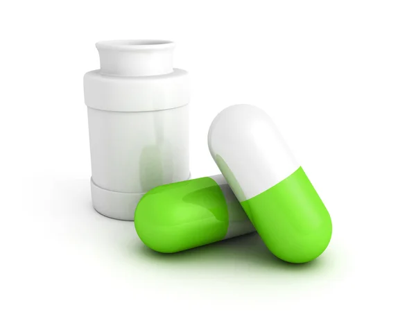 Medicine bottle and green pills — Stock Photo, Image