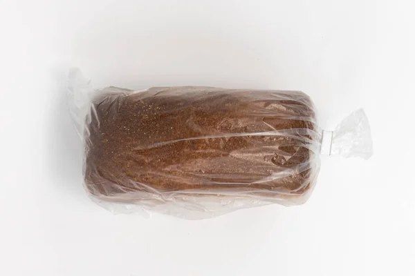 Bröd Plastpåse Hela Limpa Transparent Förpackning Isolerad Vit Bakgrund Ovanifrån — Stockfoto