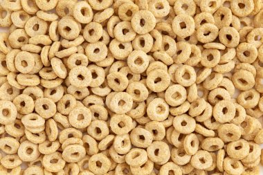 Lezzetli Cheerios yulaf gevreği, mısır gevreği arka planı, lezzetli ve kullanışlı kahvaltı.