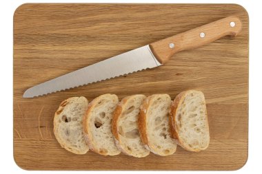 Lezzetli ekmek ve bıçak ile ahşap tahta beyaz, üst manzara, taze lezzetli ev yapımı sağlıklı pişirme