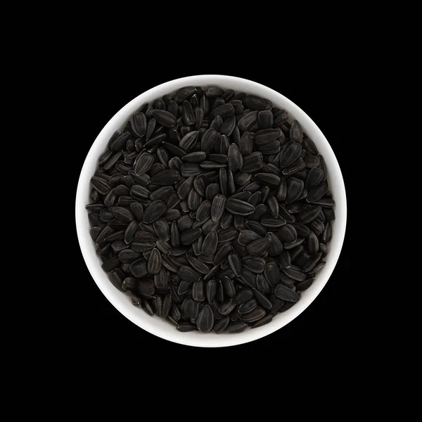 Keramická Miska Černými Slunečnicovými Semínky Izolované Černém Pozadí Horní Pohled — Stock fotografie
