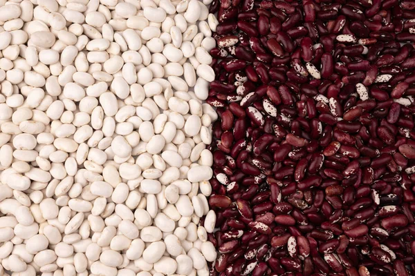 red and white kidney beans background, top view, uncooked beans mixture