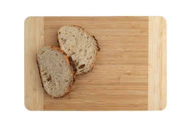 Tahtadaki iki dilim buğday ekmeği beyaz arka planda izole edilmiş metinler için boş alan, taze ekmek, üst görünüm