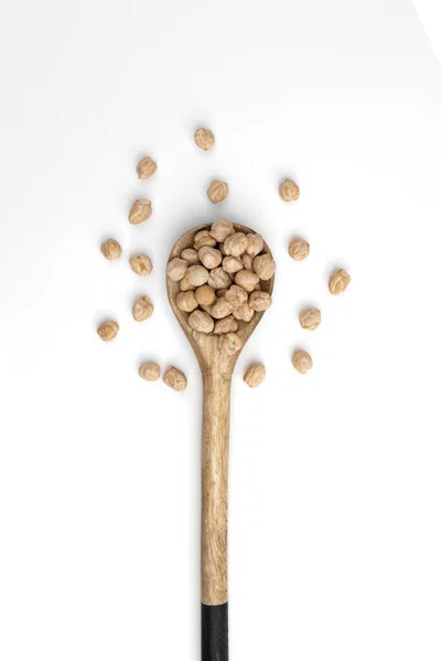 Pile Uncooked Chickpeas Isolated White Background Wooden Spoon Raw Chickpeas — Stockfoto