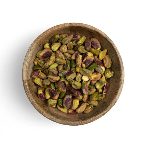 Peeled Pistachios Wooden Bowl Isolated White Background Top View Green — Stockfoto