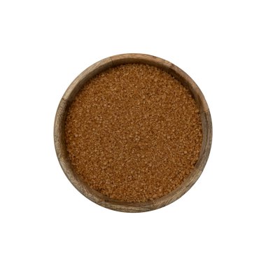 top view of unrefined natural brown sugar in wooden bowl isolated on white background, cane sugar close-up
