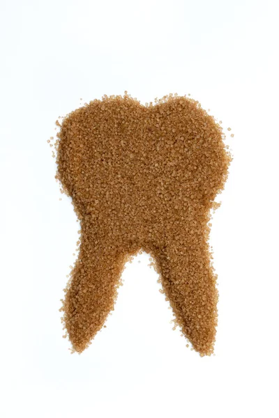 Top View Unrefined Natural Brown Sugar Laid Out Form Tooth — Fotografie, imagine de stoc