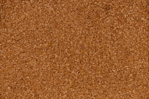 pile of brown sugar texture background with copy space, raw unrefined cane sugar pattern top view and flat lay
