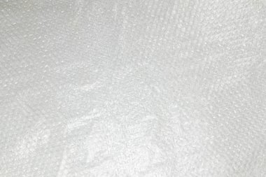 Saydam ambalaj filminin plastik şeffaf balon paketi parçası yakın plan, doku, arkaplan