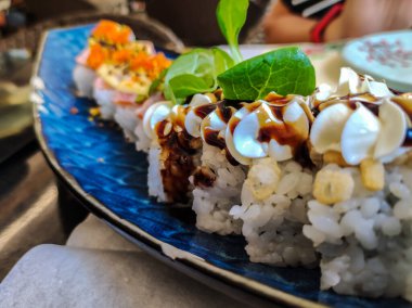 closeup on a portion of sushi in the restaurant
