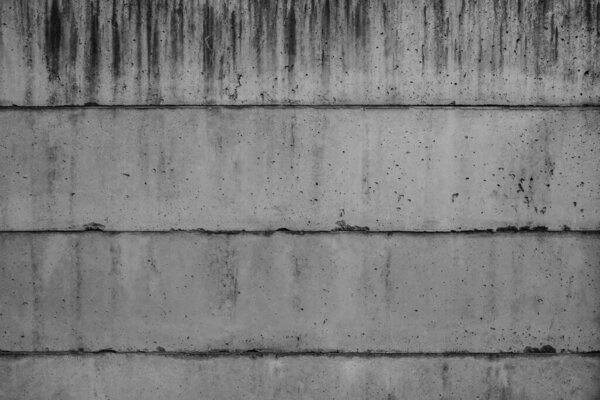 Damaged and abandoned old concrete wall texture.