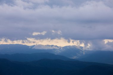 Spring sunset in Santuari Mare De Deu Del Mont peak, La Garrotxa, Spain.