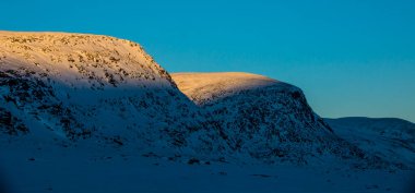 Norveç 'in güneyindeki Dovrefjell Ulusal Parkı' nda kış manzarası.