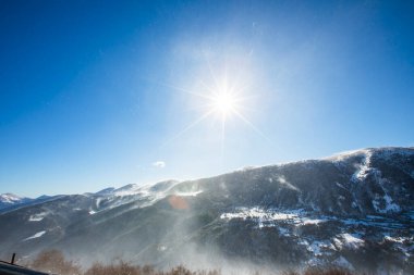 Winter landscape and snowfall in Cerdagne, Pyrenees, France.