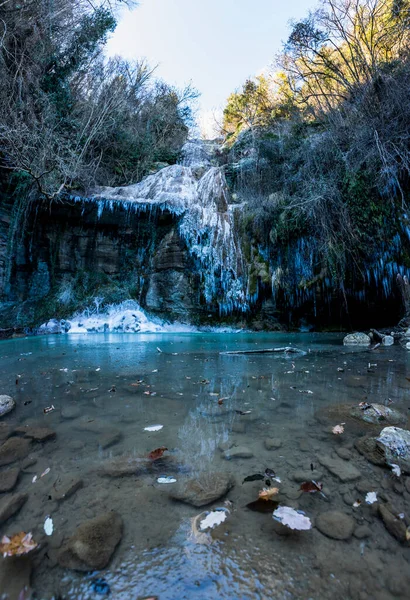 Winter landscape in Salt Del Roure waterfall, La Garrotxa, Spain.