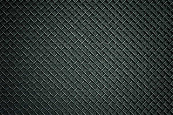 Abstract black metallic mesh texture of the speaker for background.