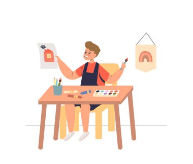 Anaokulundaki resim dersinde resim çizen küçük çocuk. Çocuklar için el sanatları dersleri