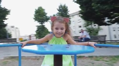 Adorable happy little girl have fun outdoors.