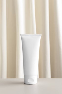 Sarı tekstil beyaz krem tüp..