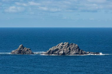The Brisons off the Cornish coast, on a sunny summer's day