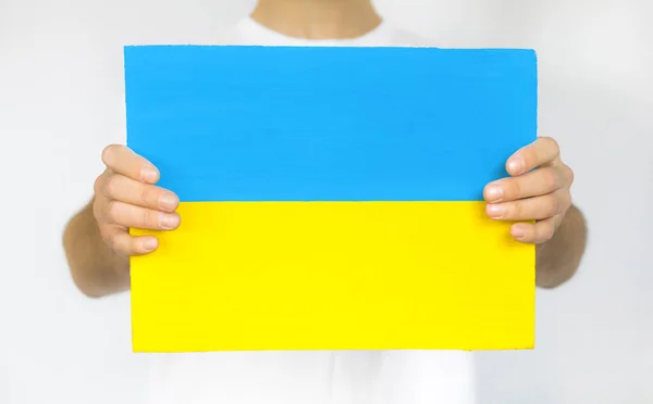 Guy Paper Form Yellow Blue Flag Ukraine White Background — Stock Photo, Image