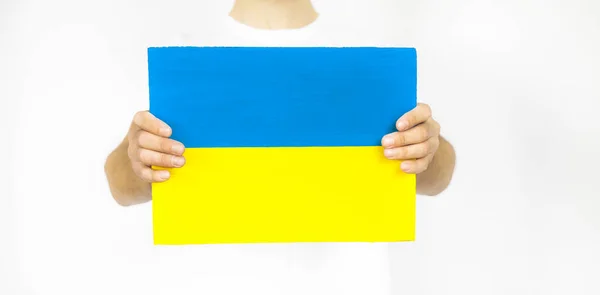 Парень Бумагами Вигляді Жовтого Синого Прапора України Белом Фоне — стокове фото